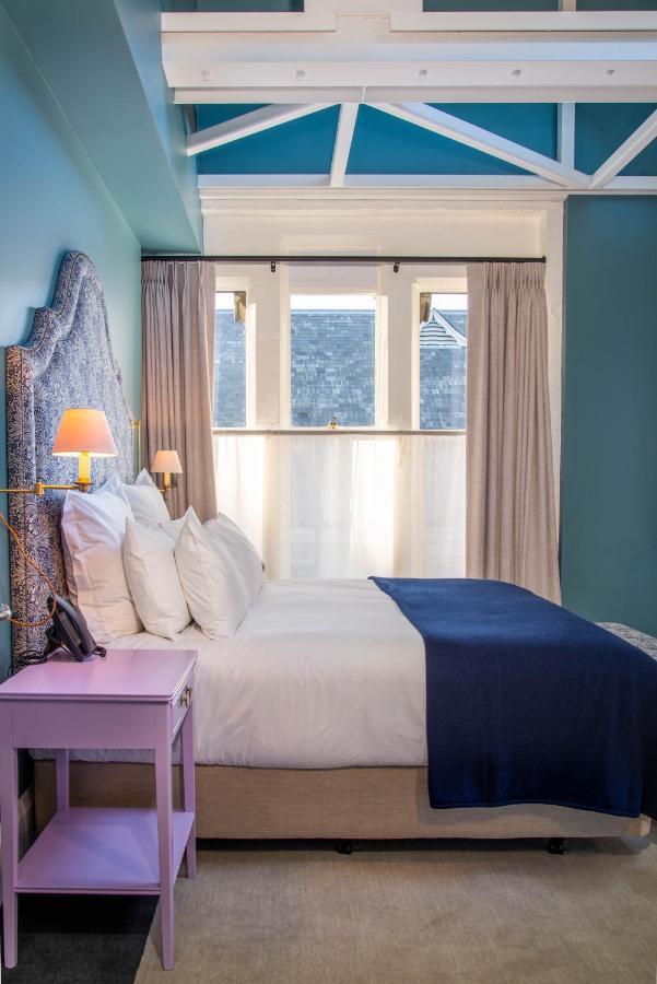 The Observatory Hotel Christchurch Exterior foto A bedroom at the hotel